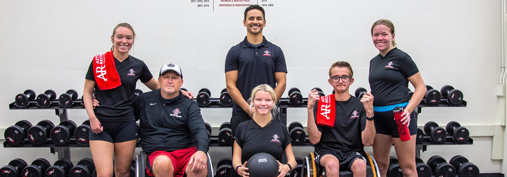 Group Photo of Strength and Conditioning Team members with Coach