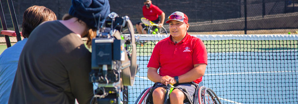 Wheelchair Tennis athlete interviewed on camera
