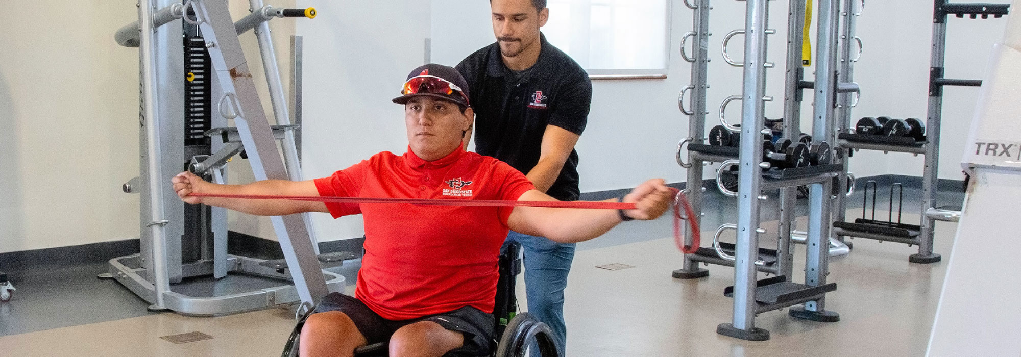 Arm Stretch instruction for a man in wheelchair