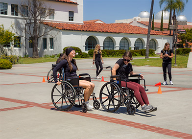 Adapted Athletics community members participating in wheelchair drills