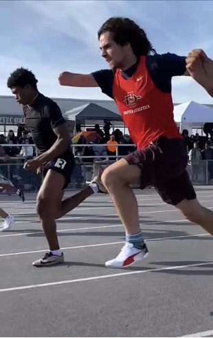 Parker Harvey sprinting at the Red & Black Meet