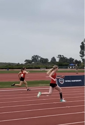 Para-athlete running on a track.
