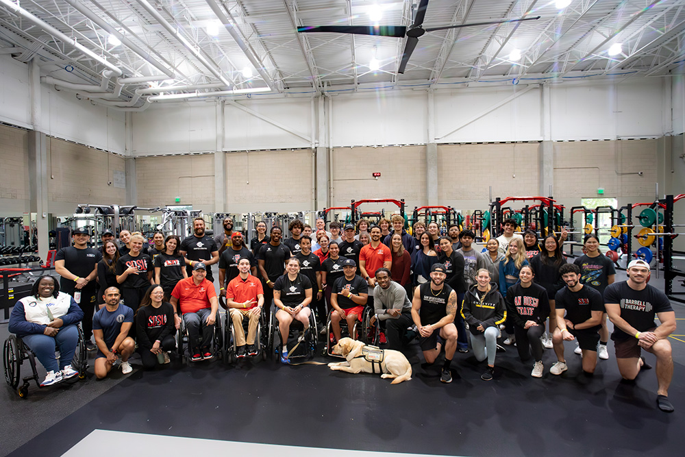 SDSU Adapted Athletics Team posing for a group photo.