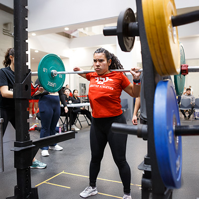 Ana Firvida performs a squat lift at the 2025 Lift-a-thon.