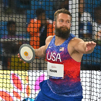 Max Rohn performing a discus throw.