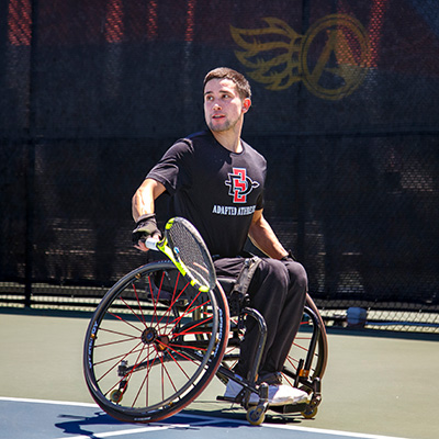 Khristian Martinez participating in a Wheelchair Tennis competition.