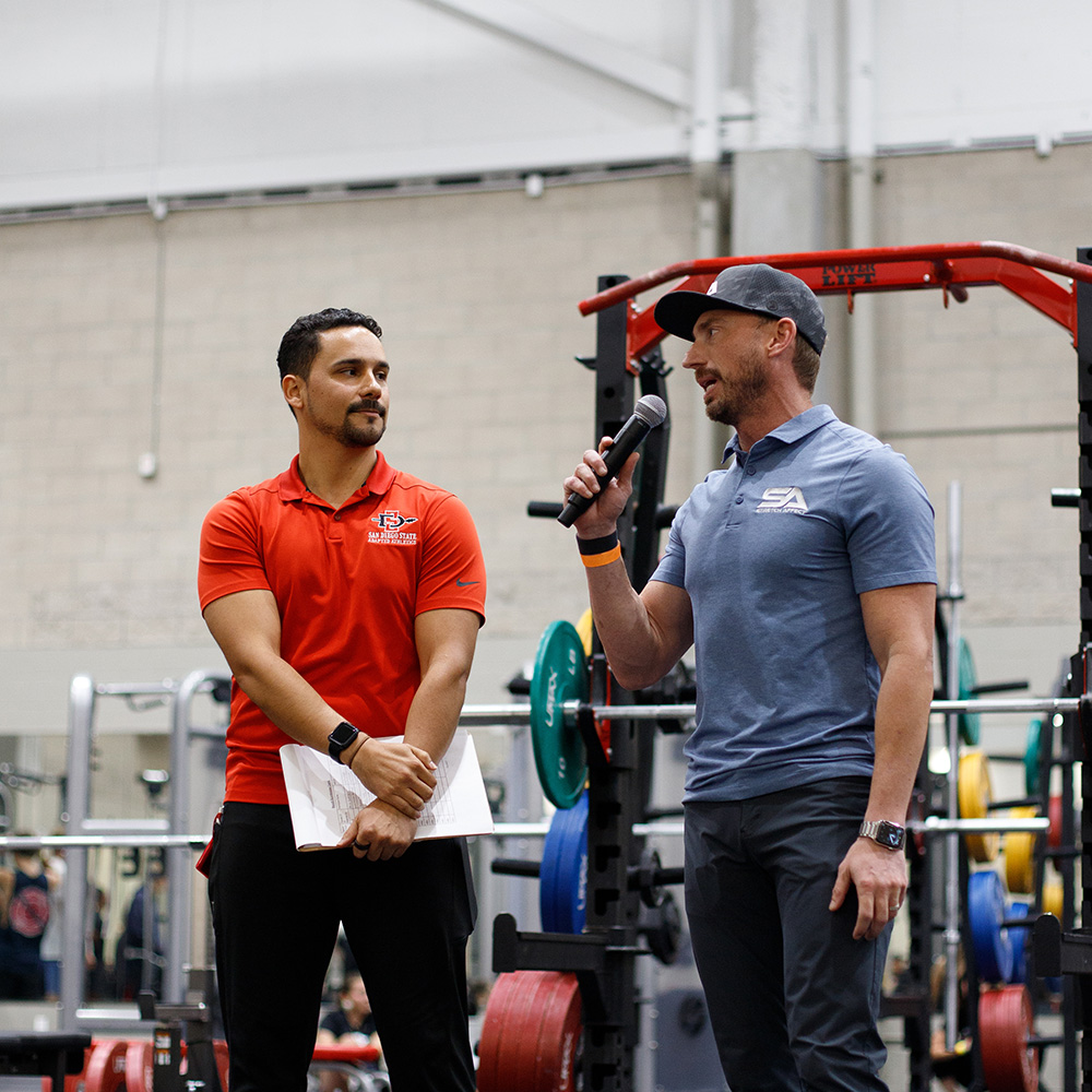 A representative from Stretch Affect speaking at the 2025 Lift-a-thon.