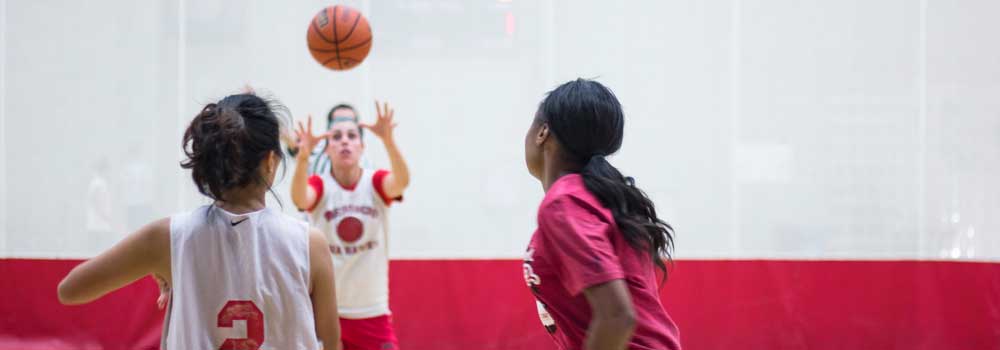 Women playing basketball at Aztec Recreation Center Courts