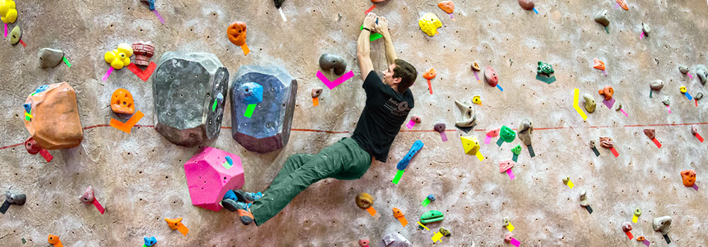 Member bouldering on the Climbing Wall