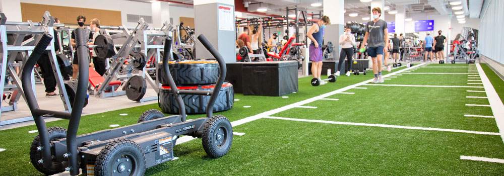 Turf field with students working out - second floor of ARC building