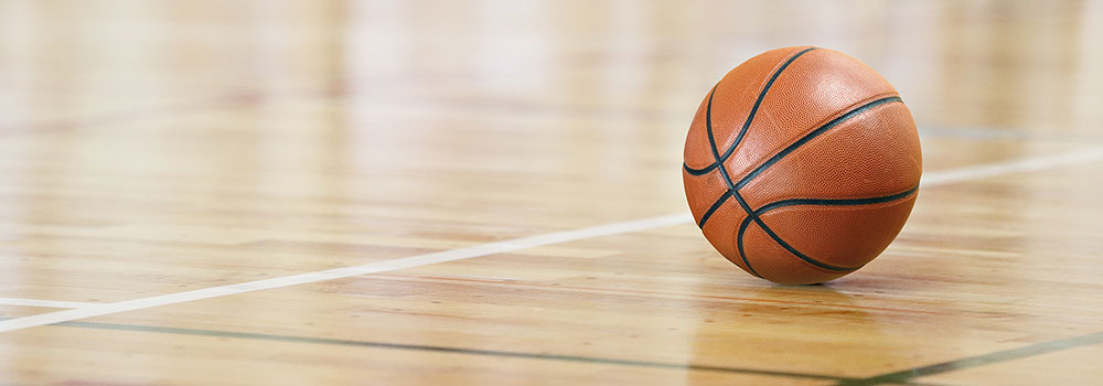 Basketball on the Court Floor