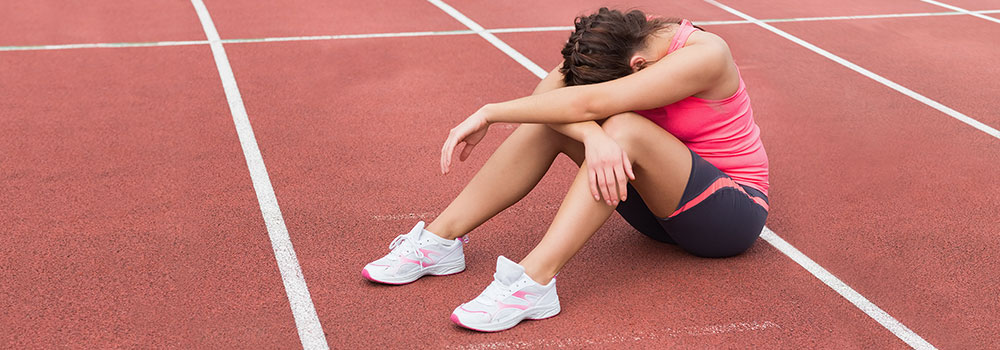 Woman sitting on Track