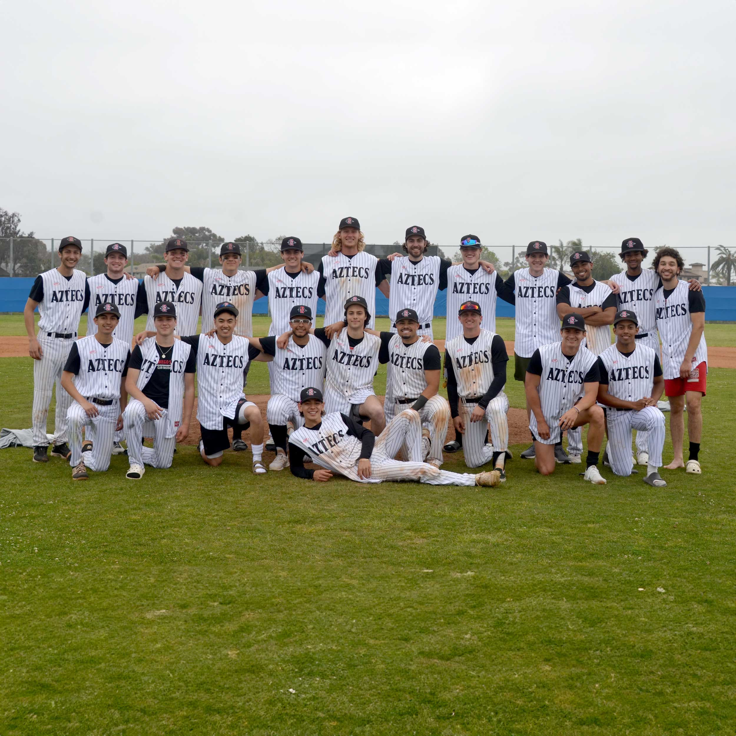 Group photo of the Baseball club team on the field