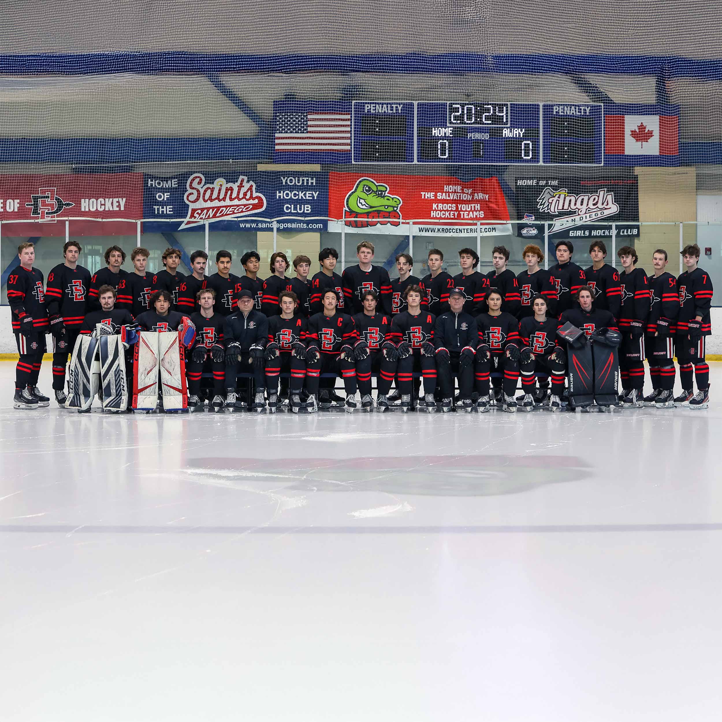 SDSU Ice Hockey Club team members group photo on ice ring