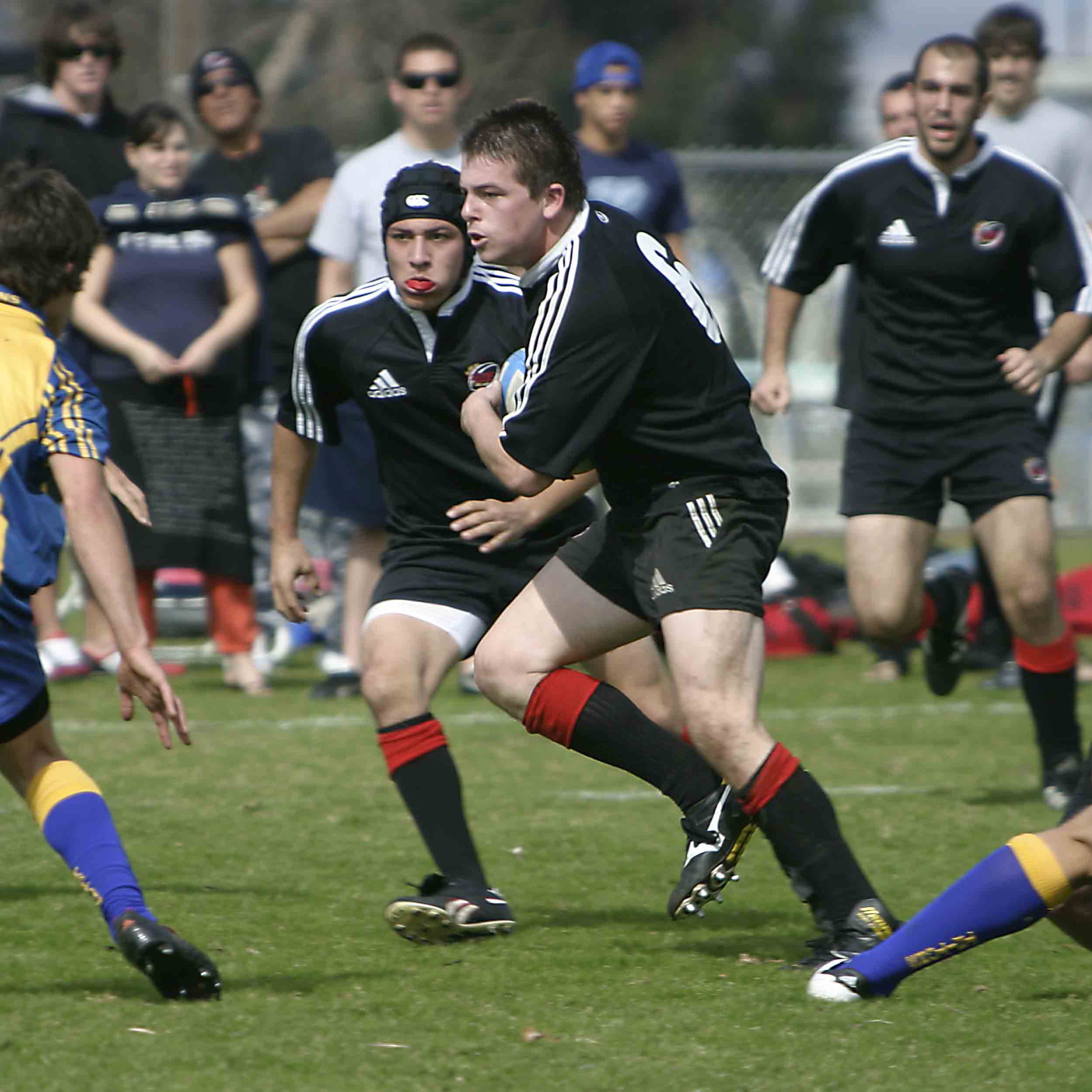 Rugby Game - Aztec Player running with ball