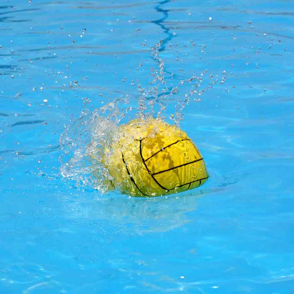 Water polo ball making a splash the pool