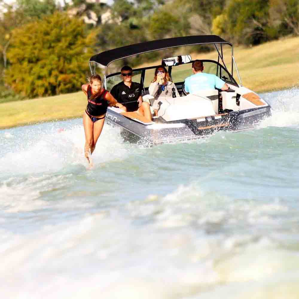 SDSU Waterski member behind a speedboat