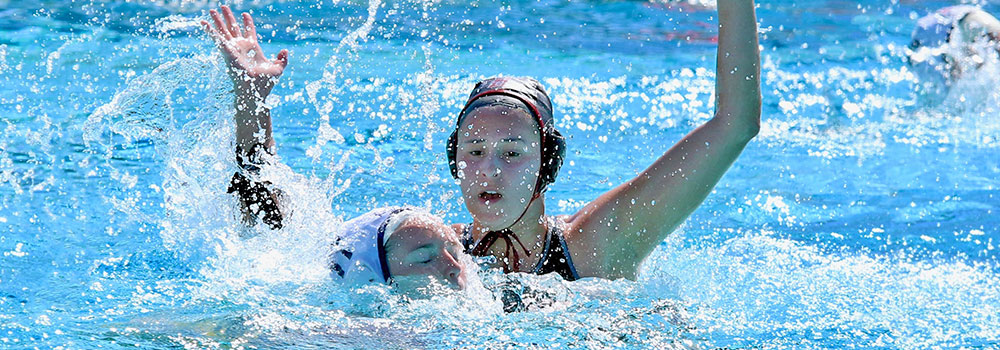Women's Water Polo Club game in the pool